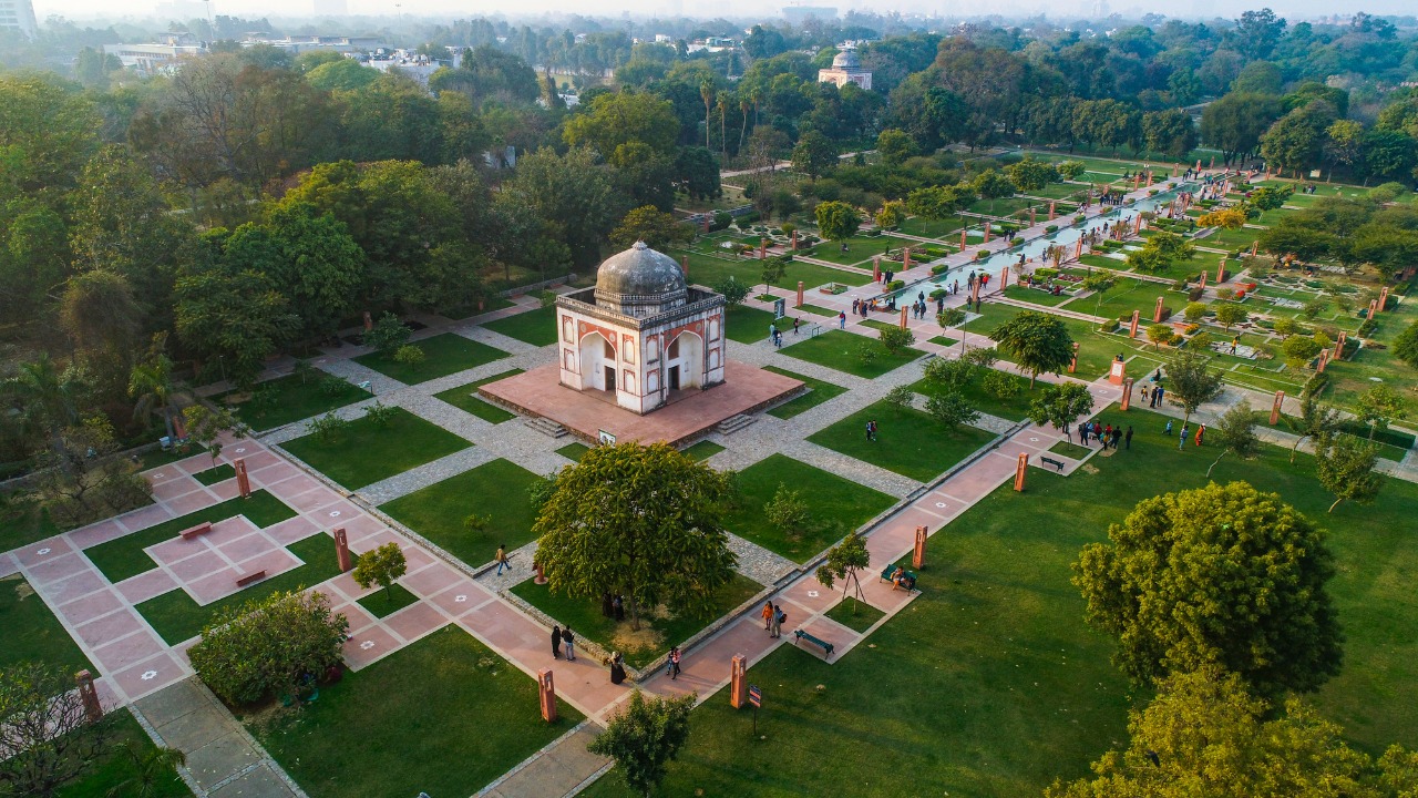 सुंदर नर्सरी sunder nursery pre-wedding shoot location, best garden photoshoot spot delhi, heritage park photography delhi, budget-friendly couple shoot in delhi, scenic green backdrop for photoshoot