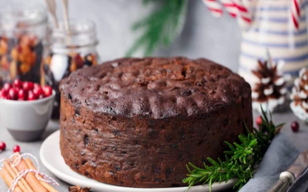 Christmas rum cake recipe rich fruit cake preparation soaked dry fruits rum cake ingredients traditional Christmas cake baking tips festive cake making